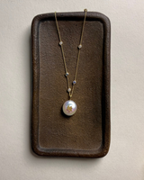 pearl pendant with chinese character serendipity
